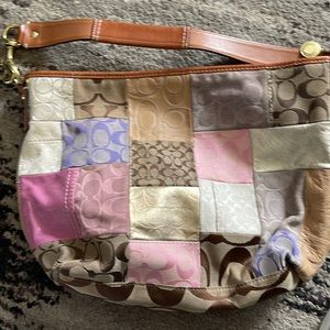 Beautiful spring Coach bag. Kinda large. Shoulder bag. Needs cleaned. Great cond
